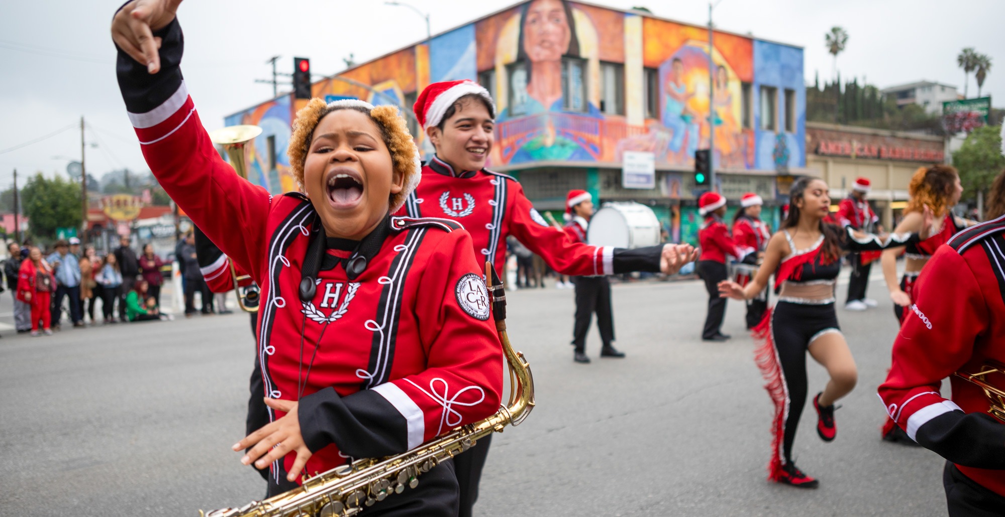 Young sax player in a holiday parade